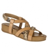 A spicy take on a shoe wardrobe essential. The comfortable Odilee sandals by Naturalizer cushion each step and gain a touch of attitude from exotic snake-print accents.