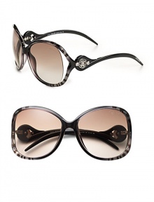 Tubular acetate frames with open lens is adorned with a signature Cavalli emblem at temple. Available in gradient black on zebra with brown gradient lens or palladium/pearl brown with brown gradient lens. 100% UV protection Made in Italy Tubular acetate frames with open lens is adorned with a signature Cavalli emblem at temple. Available in gradient black on zebra with brown gradient lens or palladium/pearl brown with brown gradient lens. 100% UV protection Made in Italy