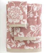 Sweet serenity. Offering a romantic and elegant composition for your bath space, this Aquarelle hand towel features pretty blooms in soft pastel hues.
