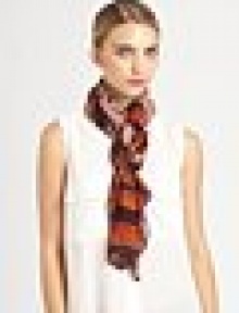 A hand-printed, tribal-inspired print on a lightweight gauze scarf.Viscose40 X 74Hand washImported A hand-printed, tribal-inspired print on a lightweight gauze scarf.Viscose40 X 74Hand washImported