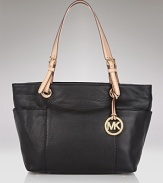 A tote for all occasions - exciting jaunts, a trip to the office and everything in between.