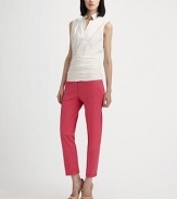 Crisp and tailored on top with jersey cummerbund waist gives this blouse a structured yet slimming shape.Mandarin collarSleevelessConcealed front closuresFront pleatsRuched bottom panelConcealed side zip74% cotton/21% polyamide/5% elastaneImported of Swiss fabricModel shown is 5'9 (175cm) wearing US size 4. 