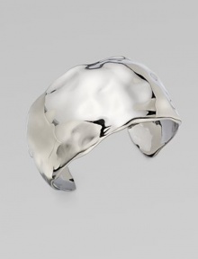 This bold, undulating cuff has a stunning liquid look and a polished gunmetal cast.Ruthenium platedDiameter, about 2¼ (adjustable)Width, about 1½Imported This bold, undulating cuff has a stunning liquid look and a polished gunmetal cast.Ruthenium platedDiameter, about 2¼ (adjustable)Width, about 1½Imported