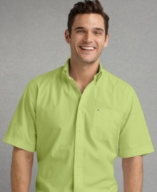 This simple button-down shirt from Tommy Hilfiger is the perfect complement to patterned shorts. This simple button-down shirt from Tommy Hilfiger is the perfect complement to patterned shorts.