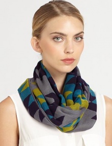 This lightweight, woven wrap is hand-printed with a bold, tribal-inspired design.Viscose40 X 78Hand washImported