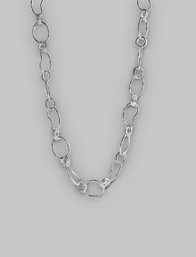 Links of various sizes and shapes join together in a long, versatile chain of polished sterling silver. Lobster claw clasp 37½ long Imported Links of various sizes and shapes join together in a long, versatile chain of polished sterling silver. Lobster claw clasp 37½ long Imported