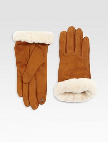 Genuine shearling cuffs perfectly complement these stylish suede gloves.Cashmere liningAbout 9 longImported