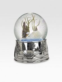 A beautiful white swan is framed by an idyllic winter scene as snow falls and the melody of Swan Lake plays.Intricately detailed silverplate base6.5HElegantly packaged for gift-giving and storageImported A beautiful white swan is framed by an idyllic winter scene as snow falls and the melody of Swan Lake plays.Intricately detailed silverplate base6.5HElegantly packaged for gift-giving and storageImported