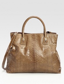 Luxurious python in a roomy top-handle satchel, perfectly sized for all your essentials.Double top handles, 5 dropDetachable shoulder strap, 23¼ dropMagnetic top closureCenter zip compartmentOne inside zip pocketTwo inside open pocketsTwo pen holdersOne money clipSuede lining14½W X 13H X 5DMade in Italy Luxurious python in a roomy top-handle satchel, perfectly sized for all your essentials.Double top handles, 5 dropDetachable shoulder strap, 23¼ dropMagnetic top closureCenter zip compartmentOne inside zip pocketTwo inside open pocketsTwo pen holdersOne money clipSuede lining14½W X 13H X 5DMade in Italy
