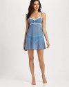 A delicate semi-sheer mesh design with scallop lace trim. Adjustable straps Ruched bust About 28 from shoulder to hem Nylon Hand wash Made in Italy 