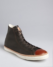 A color-block high-top in leather with an antique, vintage vibe expresses your appreciation for classic designs. A color-block high-top in leather with an antique, vintage vibe expresses your appreciation for classic designs.