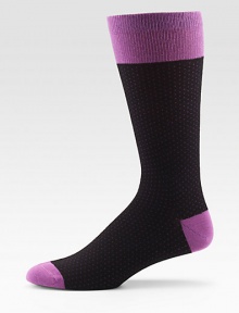 EXCLUSIVELY OURS. The right look for any man, any day of the week with a shape-retaining fit and colorful dots allover. Mid-calf height 80% cotton/20% nylon Machine wash Made in Italy 