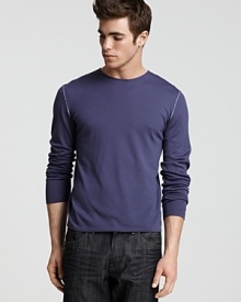 A super light - almost sheer - crewneck shirt in soft merino wool with contrast stitch details at the shoulder and elbows. A super light - almost sheer - crewneck shirt in soft merino wool with contrast stitch details at the shoulder and elbows.