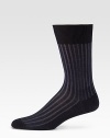 A silky, lustrous finish in fil d'ecosse cotton, ribbed with striking color and detailed with a hand-linked toe for a more durable life. Mid-calf height Cotton; machine wash Imported