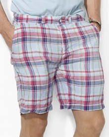 An essential classic-fitting short is crafted from lightweight linen in a preppy madras pattern for an authentic look. An essential classic-fitting short is crafted from lightweight linen in a preppy madras pattern for an authentic look.