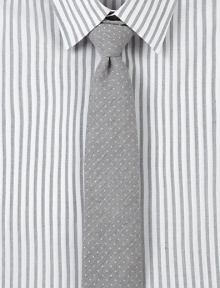 Slightly textured pindot tie adds finishing touches to any modern dress wardrobe.57% cotton/43% silkDry cleanMade in USA Slightly textured pindot tie adds finishing touches to any modern dress wardrobe.57% cotton/43% silkDry cleanMade in USA