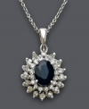 Add a burst of sparkle to your neckline. This royalty-inspired pendant by Effy Collection features an oval-cut faceted sapphire (1-9/10 ct. t.w.) surrounded by two sparkling rows of round-cut diamonds (1 ct. t.w.). Crafted in 14k white gold. Approximate length: 18 inches. Approximate drop: 1 inch.