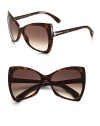 Oversized bowtie shaped resin frames with signature T logo temple. Available in shiny dark havana with brown gradient lens. 100% UV protection Made in Italy