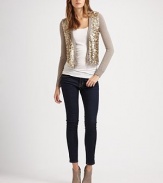Sequin-encrusted modal and cashmere blend with soft silk trim. V-neckButton frontLong sleevesSilk trimSequin-coated 85% modal/15% cashmereDry cleanImportedModel shown is 5'9½ (176cm) wearing US size 4.