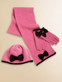 A charming beanie in a fine, soft wool blend from Italy, adorned with velvet trim and a pretty bow.Smooth knitVelvet trim40% wool/28% rayon/15% nylon/10% cashmere/7% angoraDry cleanImported