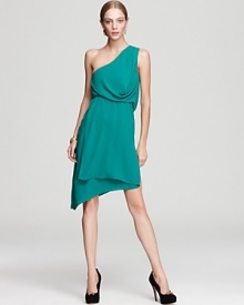 With soft, draped details, BCBGMAXAZRIA's one shoulder dress lends a vibrant look.