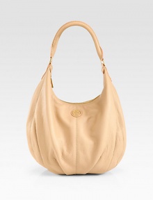 Luxurious pebbled leather in a roomy carryall with a signature logo emblem.Shoulder strap, 10 dropTop zip closureOne inside zip pocketTwo inside open pocketsOne mirrorCanvas lining13W X 10¼H X 4½DImported Luxurious pebbled leather in a roomy carryall with a signature logo emblem.Shoulder strap, 10 dropTop zip closureOne inside zip pocketTwo inside open pocketsOne mirrorCanvas lining13W X 10¼H X 4½DImported