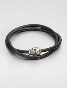 Silver skull accent joins together a double strand of smooth, genuine leather.LeatherSterling silverAbout 2½ diam.Made in the United Kingdom Silver skull accent joins together a double strand of smooth, genuine leather.LeatherSterling silverAbout 2½ diam.Made in the United Kingdom