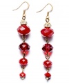 Vibrant and varied. Different sizes of glass rondelle beads combine with ravishing red hues on c.A.K.e. by Ali Khan's rondelle beaded linear drop earrings. Crafted in gold tone mixed metal, they're adorned with sparkling clear crystals. Approximate drop: 1-3/4 inches.