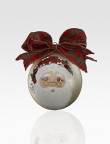 A sparkling keepsake with a lustrous metallic sheen, finished with a hand-painted embellished Santa and a charming tartan bow.Hand-painted glassBow detail4 diam.Imported A sparkling keepsake with a lustrous metallic sheen, finished with a hand-painted embellished Santa and a charming tartan bow.Hand-painted glassBow detail4 diam.Imported