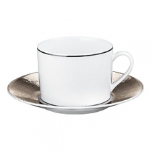 An icon of grand rich tradition of excellence, Bernardaud embodies one of the most innovative spirits among French luxury houses today. A trendsetter in design, it's porcelain collections are characterized by original forms, capturing the essence of their time. Inspired by distant deserts and drawn from timeless landscapes, Dune still bears the caress of the wind on the sand on its wide borders. With its pearly reflection and its subtle texture, the Limoges porcelain vibrates with a soft light. Based in white, classic, yet modern, Dune will forever dress your table with style. An icon of grand rich tradition of excellence, Bernardaud embodies one of the most innovative spirits among French luxury houses today. A trendsetter in design, it's porcelain collections are characterized by original forms, capturing the essence of their time. Inspired by distant deserts and drawn from timeless landscapes, Dune still bears the caress of the wind on the sand on its wide borders. With its pearly reflection and its subtle texture, the Limoges porcelain vibrates with a soft light. Based in white, classic, yet modern, Dune will forever dress your table with style.
