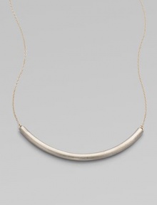 Eye-catching in its elegant simplicity, a gracefully curved, matte-finished silver bar appears to float on a delicate golden chain.SilverplatedGoldtoneLength, about 18Hook claspMade in USA Eye-catching in its elegant simplicity, a gracefully curved, matte-finished silver bar appears to float on a delicate golden chain.SilverplatedGoldtoneLength, about 18Hook claspMade in USA