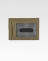 A translucent ID window on one side and iconic checks on the other: this slim and singular case is a traveler's dream. ID window Two card slots PVC 3.4 X 4.1 Imported 