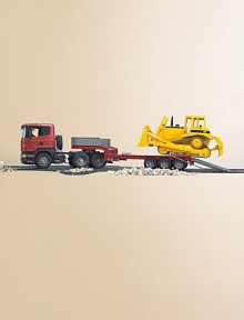 The low loader truck features a forward-tilting driver's cab, doors that open and close, a detachable trailer and soft rubber sculptured tires. The flat bed ramps lift up and are held by bars or can tilt down when the bars are unhooked, allowing the bulldozer to roll on and off. The CAT Bulldozer's blade and rake moves up and down.Plastic7.3 X 10.2 X 30Recommended for ages 3 and upMade in Germany The low loader truck features a forward-tilting driver's cab, doors that open and close, a detachable trailer and soft rubber sculptured tires. The flat bed ramps lift up and are held by bars or can tilt down when the bars are unhooked, allowing the bulldozer to roll on and off. The CAT Bulldozer's blade and rake moves up and down.Plastic7.3 X 10.2 X 30Recommended for ages 3 and upMade in Germany