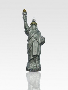 Celebrate freedom this holiday season by hanging a glittering Statue of Liberty ornament on your tree.Handmade and hand-paintedGlassAbout 8H X 3W X 1.75DImported Celebrate freedom this holiday season by hanging a glittering Statue of Liberty ornament on your tree.Handmade and hand-paintedGlassAbout 8H X 3W X 1.75DImported