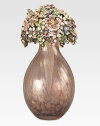 An absolutely stunning heirloom perfume bottle, delicately handcrafted in brass ox-plated pewter with glimmering Swarovski crystal embellishment. Perfume not includedSwarovski crystalsBrass ox-plated pewter2¼W X 4¾H X 2DMade in USA