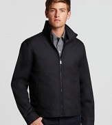 With its zip-in vest lining that can be worn alone, this sleek Michael Kors track jacket makes for a smooth winter warm-up.