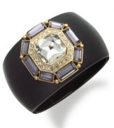 Become the center of attention with this radiant cuff bracelet from Charter Club. The black cuff is complemented by a decorative design of purple and clear glass accents. Crafted in gold tone mixed metal. Approximate diameter: 2-1/4 inches.