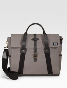 A versatile, thoroughly modern briefcase in work twill, a heavy-handed cotton twill designed with hard use and durability in mind. Buckle/zip closure Top handle Adjustable, detachable shoulder strap Exterior, interior organizing pockets Cotton twill 15½W X 13H X 5D Imported A versatile, thoroughly modern briefcase in work twill, a heavy-handed cotton twill designed with hard use and durability in mind. Buckle/zip closure Top handle Adjustable, detachable shoulder strap Exterior, interior organizing pockets Cotton twill 15½W X 13H X 5D Imported