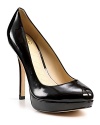 Keep your work wardrobe exciting with these patent leather platform pumps.