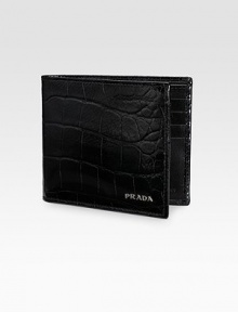 Fine calfskin leather with silvertone logo accent. Two bill compartments, eight card slots 4¼W X 3¾H Made in Italy Fine calfskin leather with silvertone logo accent. Two bill compartments, eight card slots 4¼W X 3¾H Made in Italy