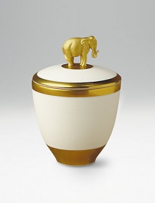 Exotic design in fine porcelain holds a scented candle inside and is topped with a gold-painted elephant. Handpainted 14k gold trim Pink Champagne scented candle Crafted with Limoges porcelain paste Beautifully gift boxed About 5H Made in Portugal Exotic design in fine porcelain holds a scented candle inside and is topped with a gold-painted elephant. Handpainted 14k gold trim Pink Champagne scented candle Crafted with Limoges porcelain paste Beautifully gift boxed About 5H Made in Portugal