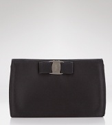 A signature grosgrain bow lends polished sophistication to Salvatore Ferragamo's satin mini bag.