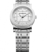 Burberry timepiece features a stainless steel bracelet and round case. Silver tone etched dial with logo, date window at 3 o'clock and polished silver tone indices. Three hands. Swiss movement. Water resistant to 30 meters. Two-year limited warranty.