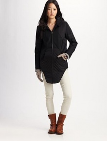 Soft quilting adds a cozy touch to this ultra-modern design finished with an exaggerated shirttail hem.Hood Foldover collar Zip-front Zip-cuffs Front slash pockets Exaggerated shirttail hem About 37 from shoulder to hem Wool Dry clean Made in USA of imported fabric Soft quilting adds a cozy touch to this ultra-modern design finished with an exaggerated shirttail hem.Hood Foldover collar Zip-front Zip-cuffs Front slash pockets Exaggerated shirttail hem About 37 from shoulder to hem Wool Dry clean Made in USA of imported fabric