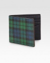 Using the tartan of a historic Scottish military guard, this leather wallet dresses up a classic wool fabrication.One bill compartmentSix card slotsLeather4W x 4HImported