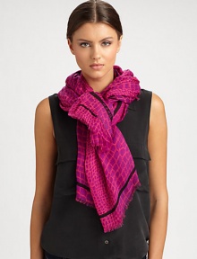A vivid croc print and contrasting stripe with logo detail define this eye-catching wrap.Modal55 X 77Dry cleanImported A vivid croc print and contrasting stripe with logo detail define this eye-catching wrap.Modal55 X 77Dry cleanImported