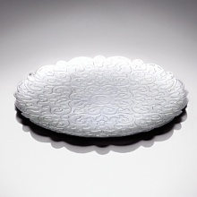 This polished, patterned round tray by designer Marcel Wanders makes a stunning centerpiece for your tabletop. This polished, patterned round tray by designer Marcel Wanders makes a stunning centerpiece for your tabletop.
