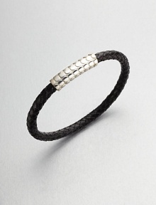 A simple design with modern sensibilities defines this woven leather bracelet, accented by a sterling silver clasp.LeatherSterling silverAbout 3 diam.Made in the United Kingdom A simple design with modern sensibilities defines this woven leather bracelet, accented by a sterling silver clasp.LeatherSterling silverAbout 3 diam.Made in the United Kingdom