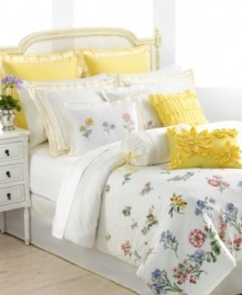 Sculpted of pure cotton, this European sham from Lenox features a bright ground of daffodil yellow with delicately embroidered dots and scalloped edges. So graceful and elegant, this European sham enhances the charming Flowering Meadow bedding collection. Sculpted of pure cotton, this European sham from Lenox features a bright ground of daffodil yellow with delicately embroidered dots and scalloped edges. So graceful and elegant, this European sham enhances the charming Flowering Meadow bedding collection.
