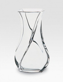 A remarkable vase crafted in France with smooth, fluid lines and a graceful shape. An elegant piece ideal for favorite flowers or nothing at all. From the Serpentin Collection 6 high Hand wash Made in France A remarkable vase crafted in France with smooth, fluid lines and a graceful shape. An elegant piece ideal for favorite flowers or nothing at all. From the Serpentin Collection 6 high Hand wash Made in France